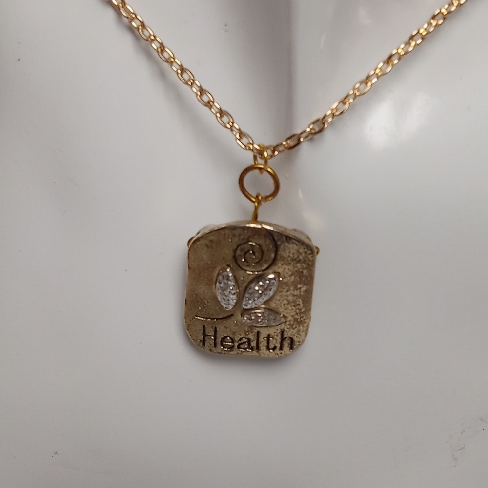 Hand Crafted Gold and Silver Necklace with Leaves Pendant